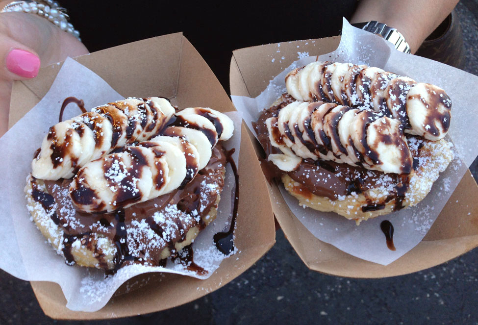 Nutella waffle with bananas and chocolate drizzle